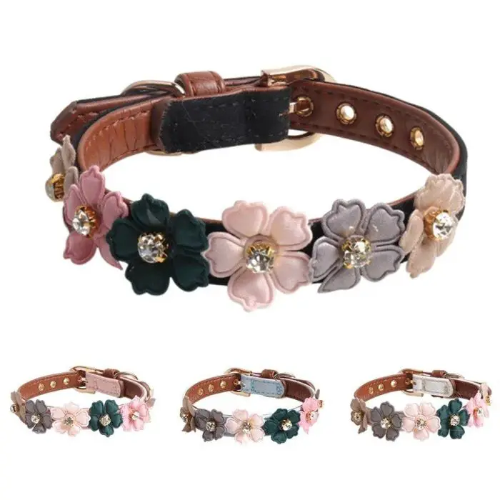 A brown leather dog collar adorned with colorful floral decorations and diamond-studded accents. The image showcases the adjustable 10014-d94bd7.jpg from different angles.