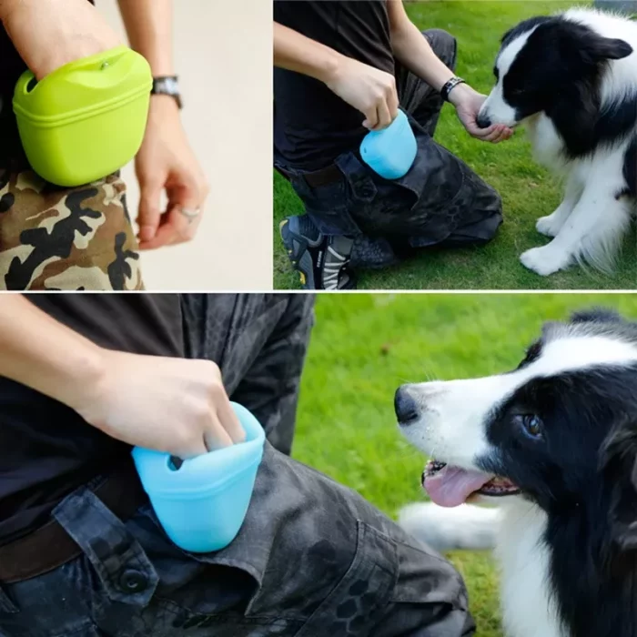 Person wearing camouflage pants holds a 10081-e271cc.webp, giving treats to a black-and-white dog in an outdoor setting, perfect for dog training.