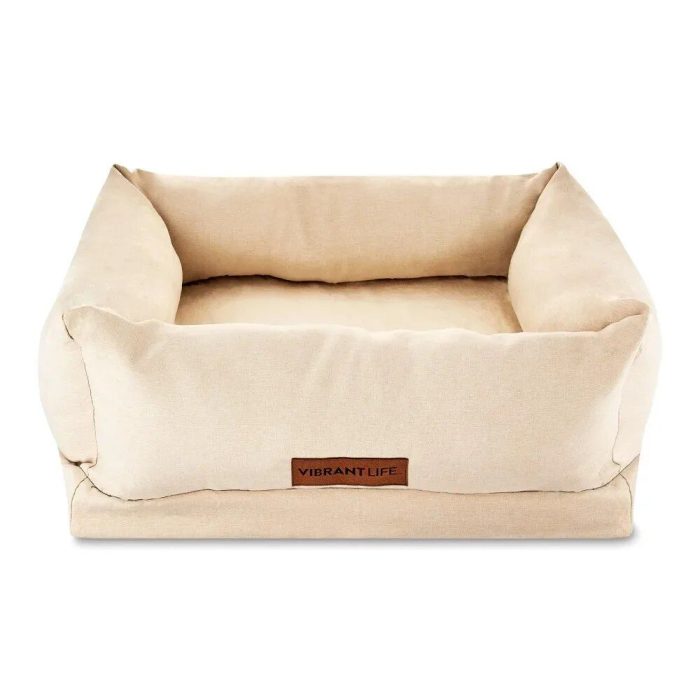 A rectangular beige 10199-6a6053.jpg with raised sides and a label reading "Vibrant Life" on the front, perfect for small dogs or cats.