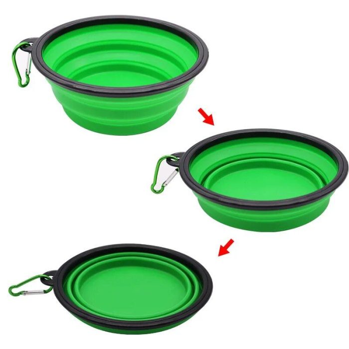 A 10365-17fada.jpg with a black rim, shown in three stages: fully expanded, partially collapsed, and fully collapsed. Each pet bowl has a carabiner attached for portability.