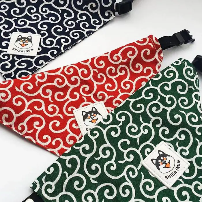 Three 10750-20cc5c.jpg in blue, red, and green, each featuring a white swirl design and a Shiba Inu logo patch.