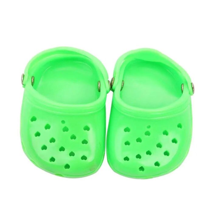 A pair of bright green clogs with heart-shaped ventilation holes on the top, perfect for those who prefer stylish 10769-8a62d1.jpg.