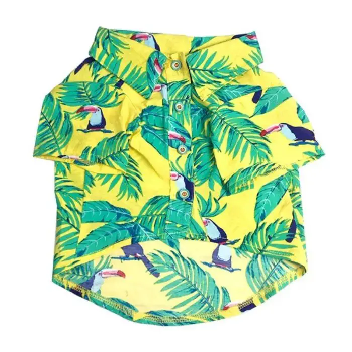 Bright yellow, tropical-themed shirt for pets, adorned with green palm leaves and toucans. This 10824-265213.jpg features a stylish button-down design.