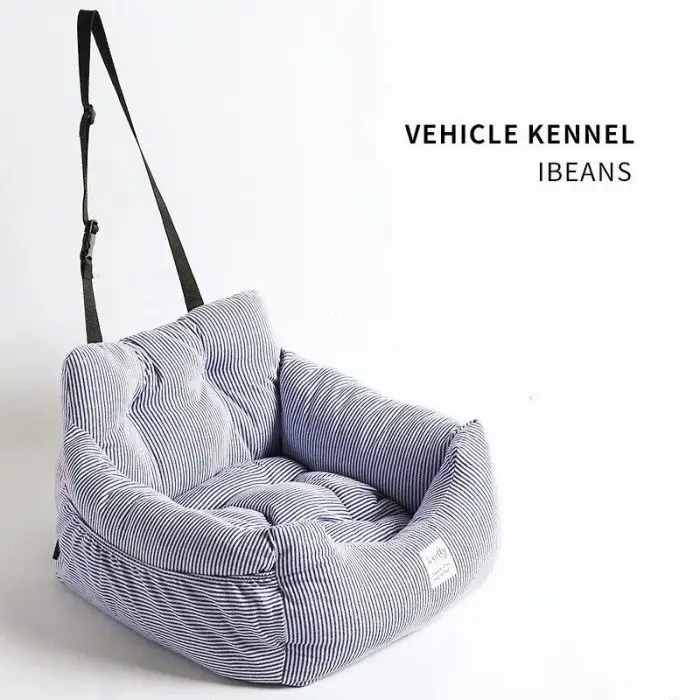 A grey and white striped pet car seat with an adjustable strap, perfect for securely transporting your furry friend. Text reads "Vehicle Kennel" and "11111-cb302c.jpg".