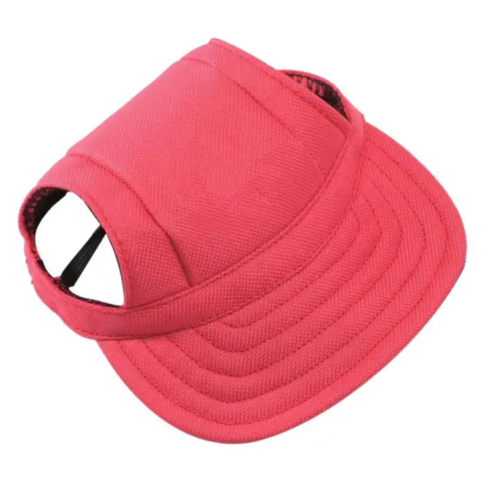 Introducing the 12318-7eecd6.jpg, a red fabric baseball cap with a distinctive folded design that reveals the inside lining and part of the brim—ideal for pet owners seeking a stylish accessory for their furry companions.