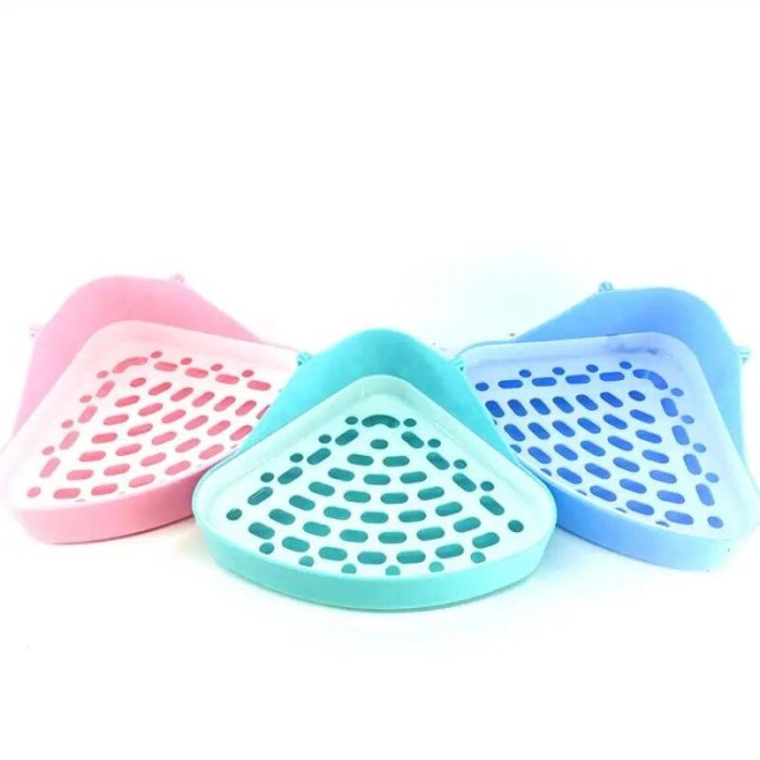 Four plastic corner bathroom racks in vibrant pink, green, and blue colors are showcased. Each rack features a perforated design for drainage, reminiscent of a litter scooper. (Product name: 12583-eb28ae.jpg)