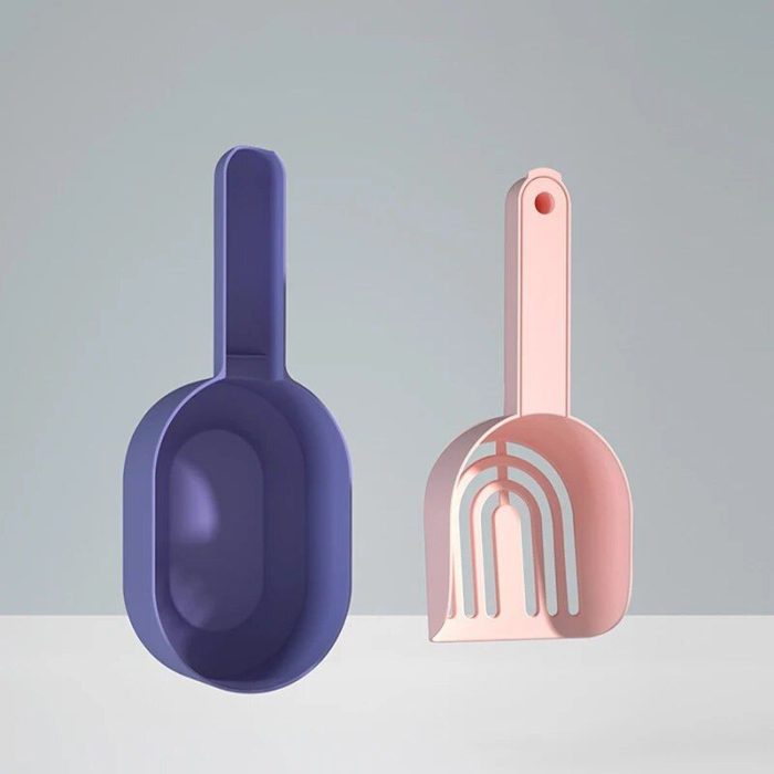 Two kitchen scoops named 12584-f384ab.jpg, one in a solid blue color and the other featuring a hollow rainbow design in pink, self-cleaning and effortlessly stylish, stand upright against a light gray background.