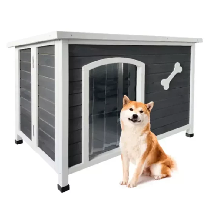 A Shiba Inu sits in front of the 12744-44966d gray and white wooden dog house, complete with a bone decoration and a clear plastic door flap.