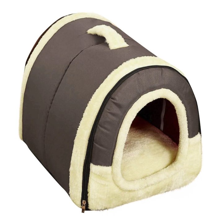 The 12748-73058f.jpg is a small, enclosed dog house characterized by its dark brown exterior and light beige, plush lining. It boasts a dome-like shape with a front entrance and a convenient carrying handle on top.