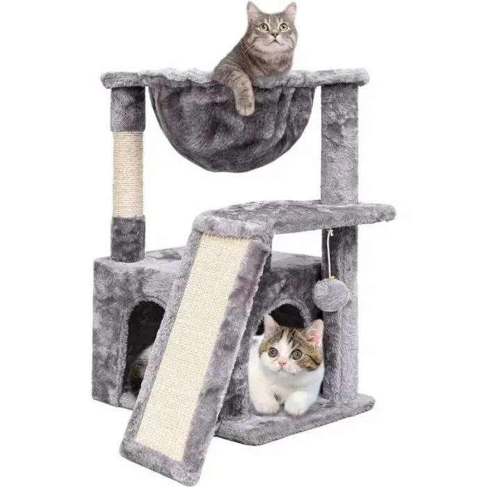 Two cats on the 12807-7b8a4b Cat Activity Tower; one cat is perched in a hammock at the top level, while the other cat cozily nests inside a cubby hole at the bottom.