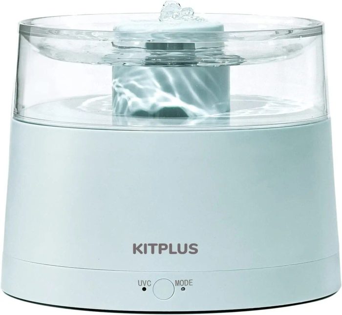 A Kitplus Cat Water Fountain in white, with a transparent upper section marked by UV-C and mode buttons on the front, and water flowing from an opening at the top.