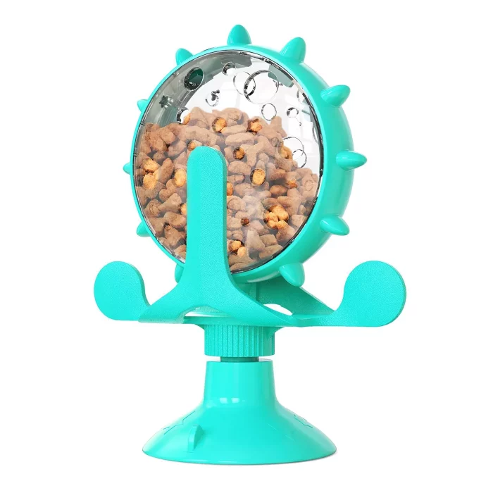 The product "12819-556c99.webp" is a teal cat turntable toy featuring a rotating feeder, a suction cup base, and a transparent food container filled with pellets. It includes multiple entry holes for dispensing cat food.