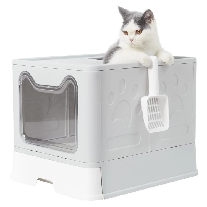 A white and gray cat sits atop a 9845-9a90a4.jpg with a scooper attached to the side and a paw print design on the front.