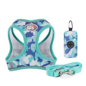 A blue and gray camouflage 9940-570b01.jpg including a harness, leash, and poop bag dispenser with a carabiner.